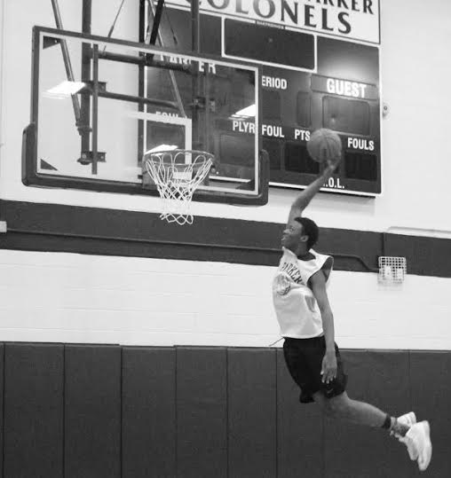Marc Taylor dunks during one of the final practices.