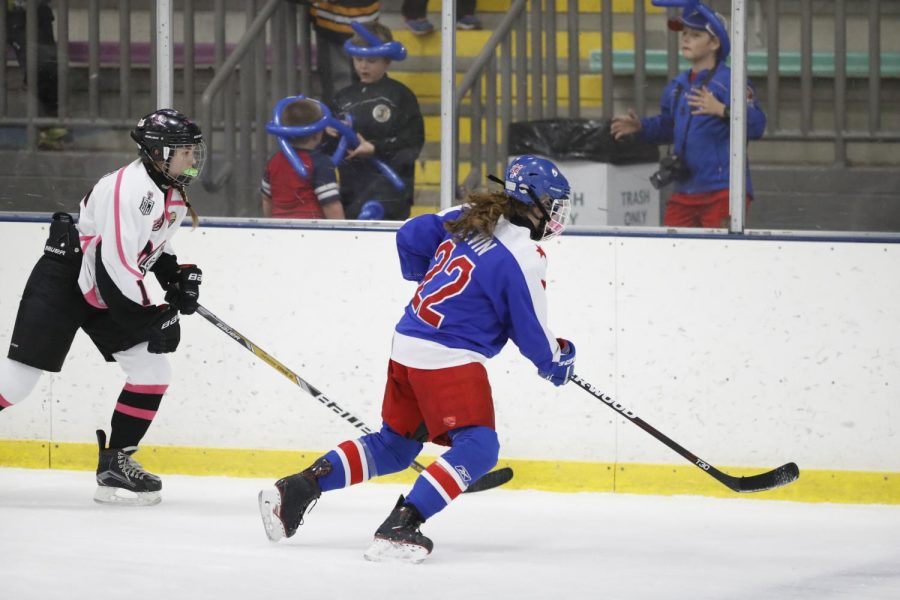 ophomore Claire Levin playing for her club ice hockey team.