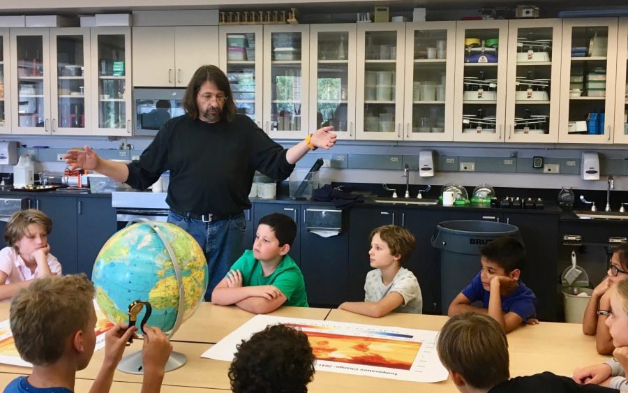 Dr. Stevens explains to the  fifth graders how computers generate models of climate change.