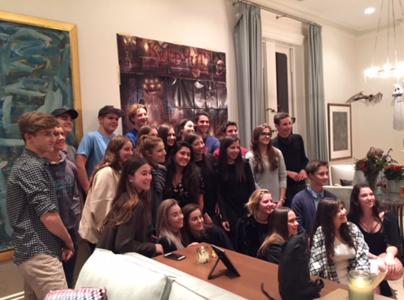 All of the Belgian students take a photo with their host.