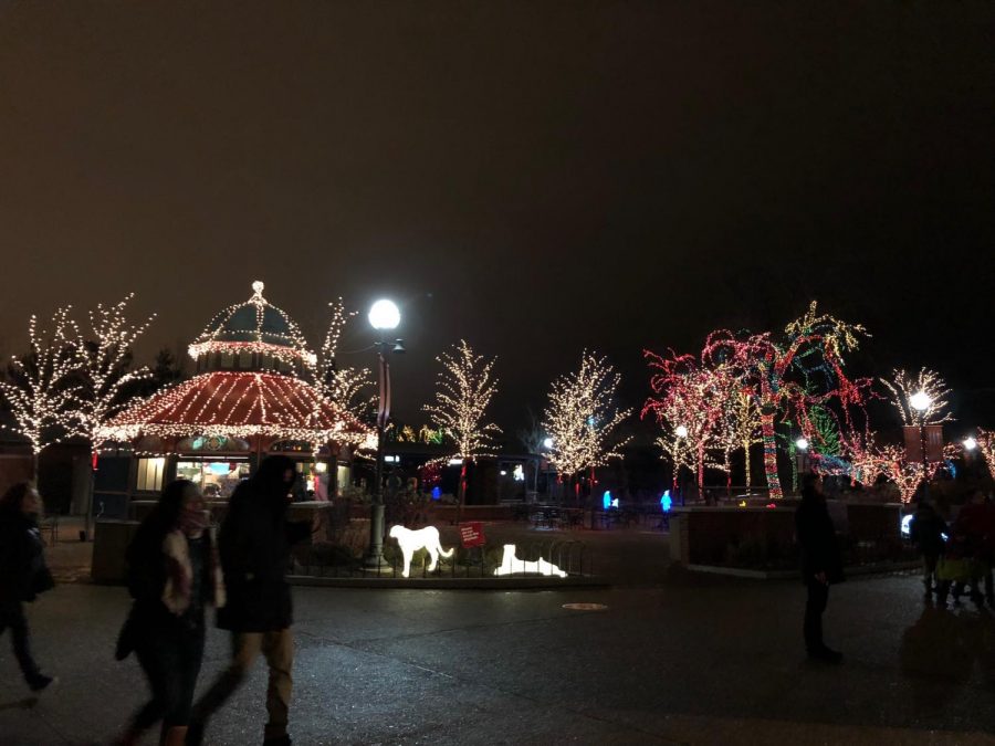 The iconic Landmark Cafe in the center of The Lincoln Park Zoo stands decorated with lights and surrounded by visitors on the opening night of Zoo Lights 2017.