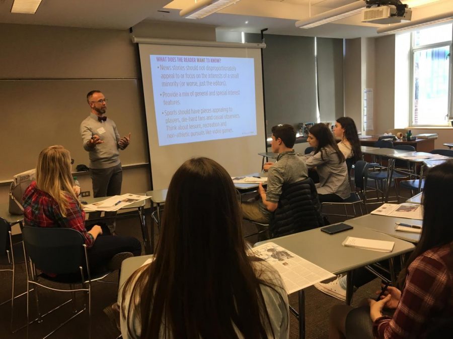 Logan Aimone, faculty advisor to the U-High Midway, hosts a session at Journalism and Society Today. 