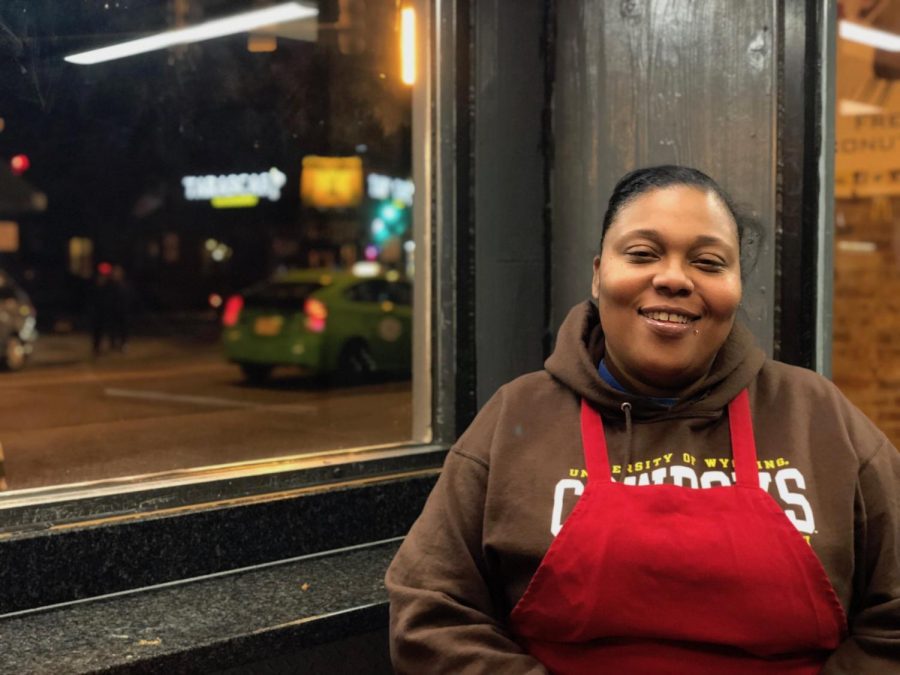 Roberta “Poochie” Jackson sits at the counter at Weiner Circle in Lincoln Park during her 10pm to 5am shift. 