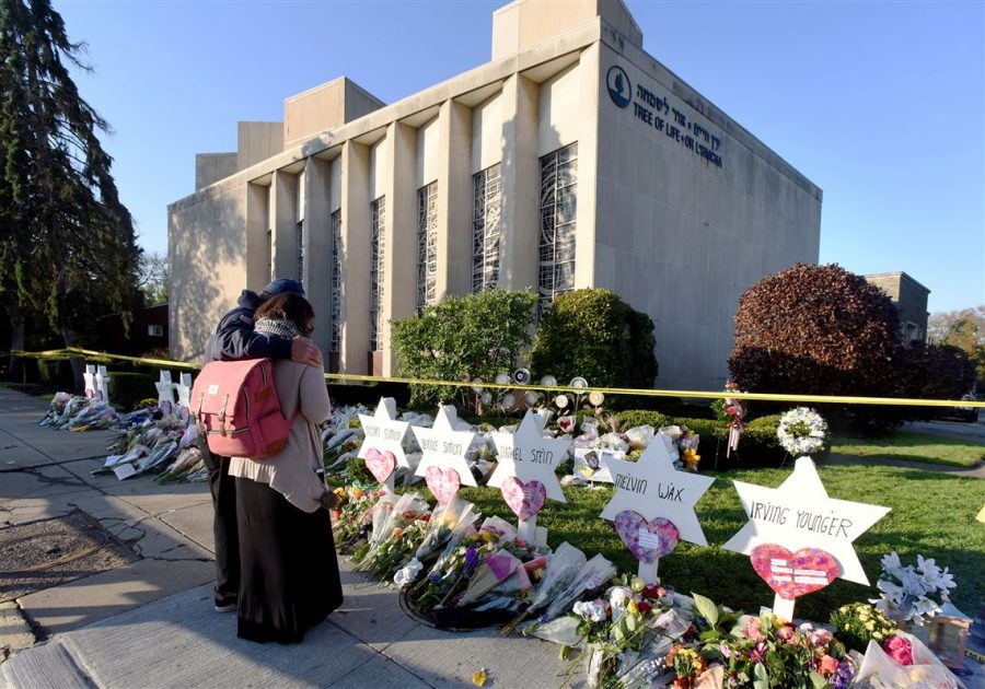 Chaplain Bob Ossler comforts woman near Tree of Life—a Pittsburgh congregation.
Photo courtesy of the Pittsburgh Post-Gazette