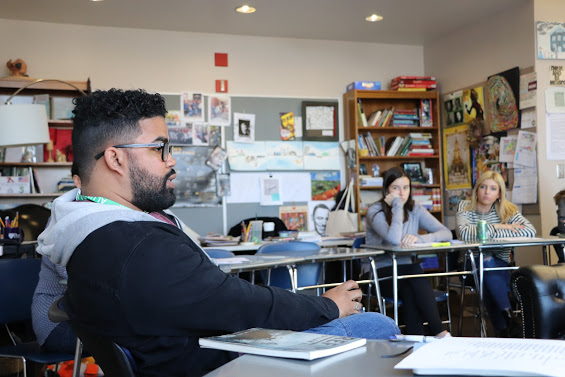 The alumni poets each spent time meeting with Upper and Middle School classes. Julian Randall ‘11 spent some of his time with Theresa Collins’s senior elective “Issues of Race, Class Gender, and Sexual Orientation. Photo courtesy of Francis W. Parker School.