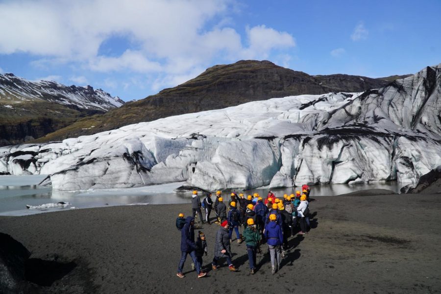 Members of the trip gear up at a glacial outlet.