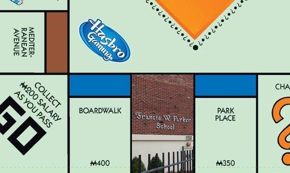 The newest edition of the Monopoly game board, now updated to reflect Parker’s acquisition of Boardwalk and Park Place.