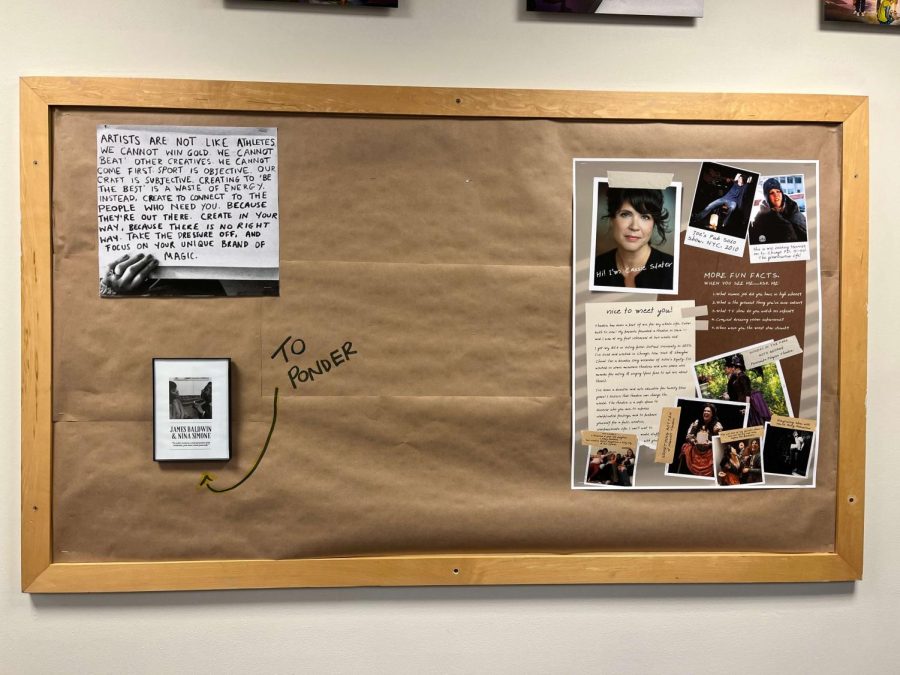 The bulletin board featuring fall play artifacts outside of Cassie Slaters room.