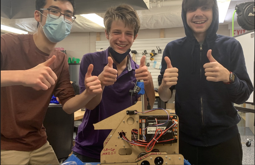 FTC+3507+Robotheosis+Members+give+thumbs+up+with+their+robot+prototype+from+last+year+that+was+hastily+modified+for+distance+sensor+testing.