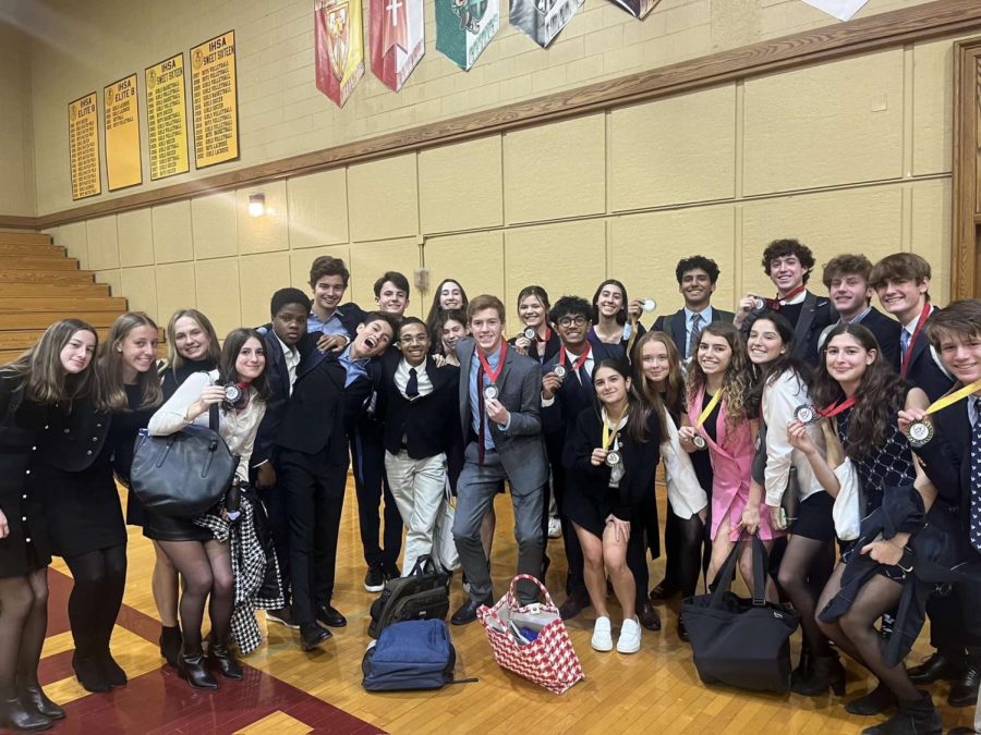 Parkers Model UN team gathers after a triumphant day of symposia.