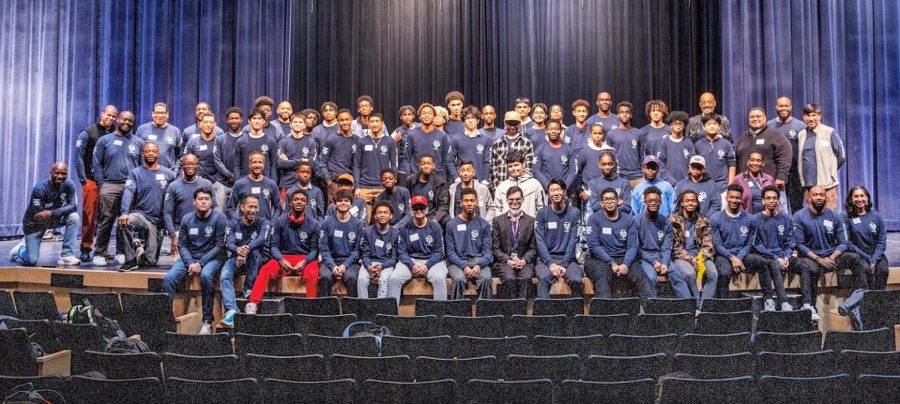 Students and faculty pose at the Young Men of Color
Conference.