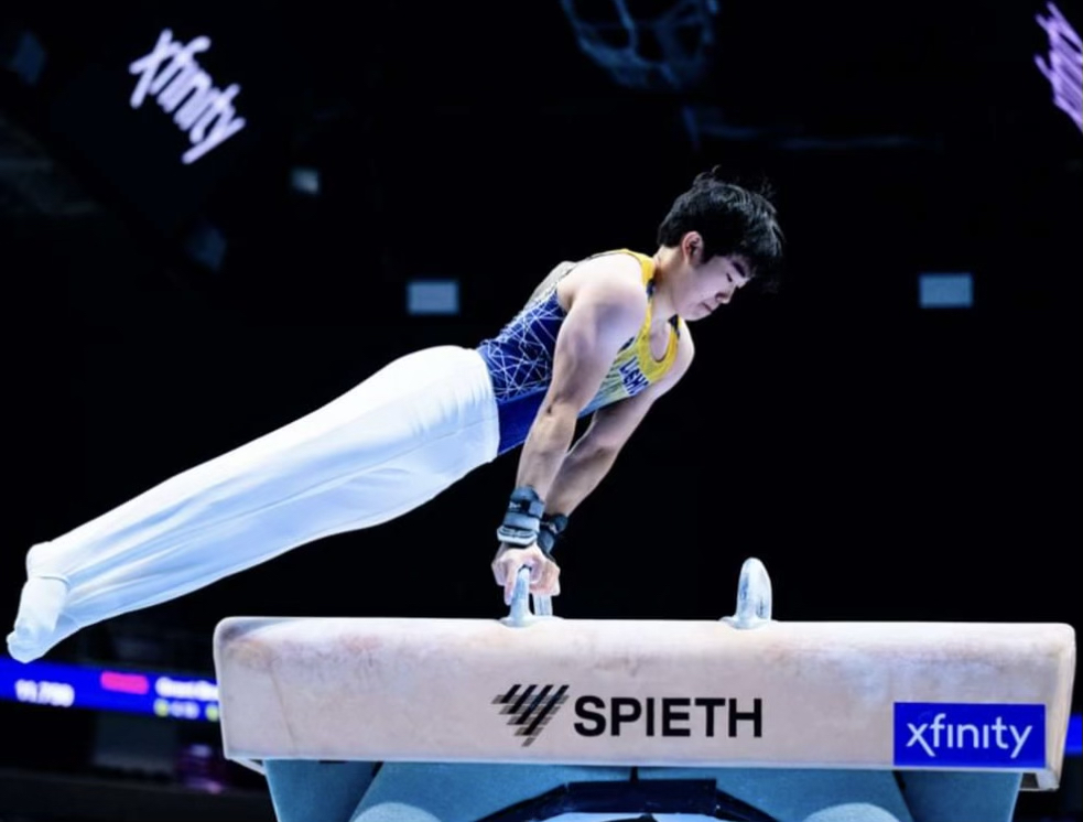 Kai Uemura competes on the pommel horse at the gymnastics national championships.