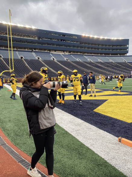Anna Fuder takes photos of the Michigan Wolverines Football team at the Big House. 