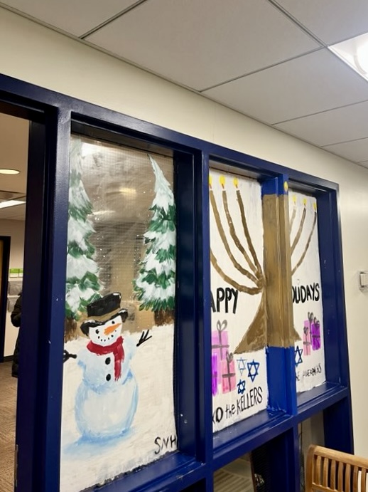 Window paintings in the administrative hallway.