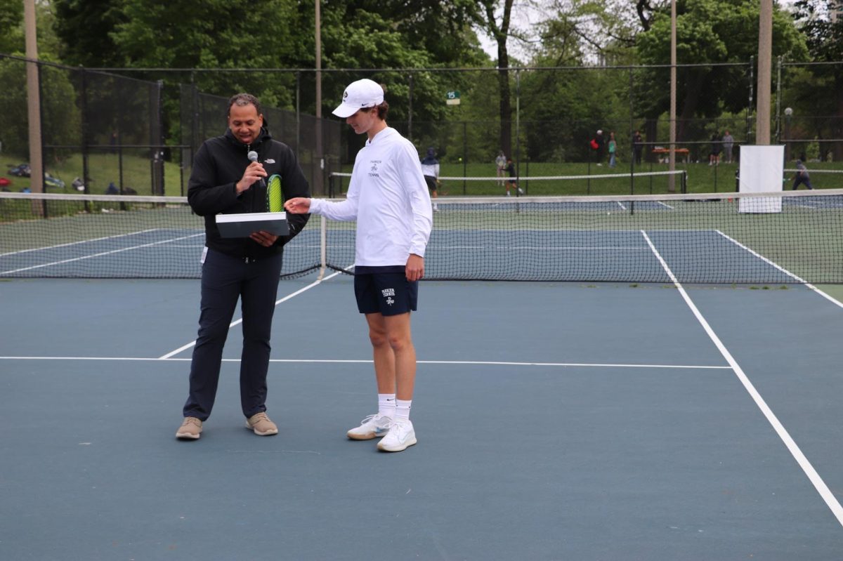 Athletic Director Bobby Starks announces senior night for the boys tennis team at Waveland Tennis Courts.