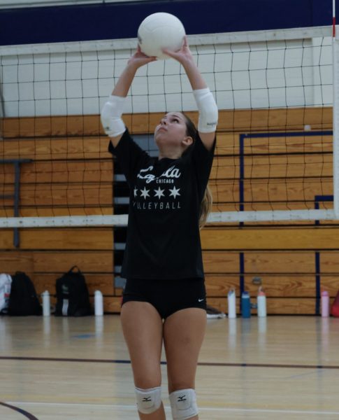 Captain Lilah Weed sets the volleyball during preseason practice