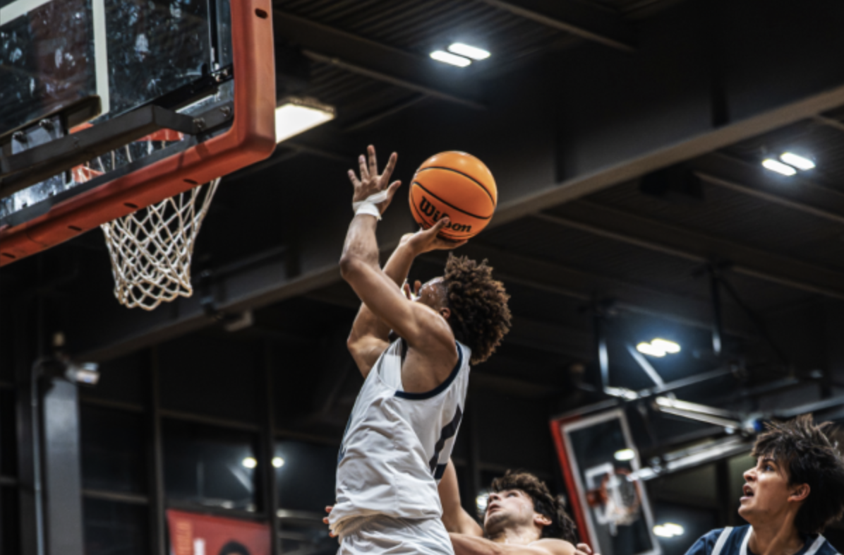 Sophomore Chris Chiles goes for a shot during the Clark Street Classic
