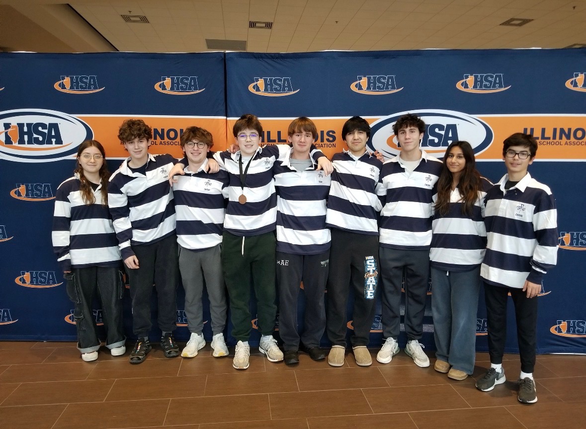 The Varsity Chess Team celebrates with a team photo at IHSA tournament