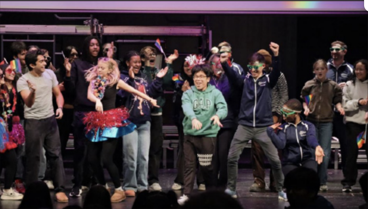 High schoolers and teachers dance together during the final lip sync song.